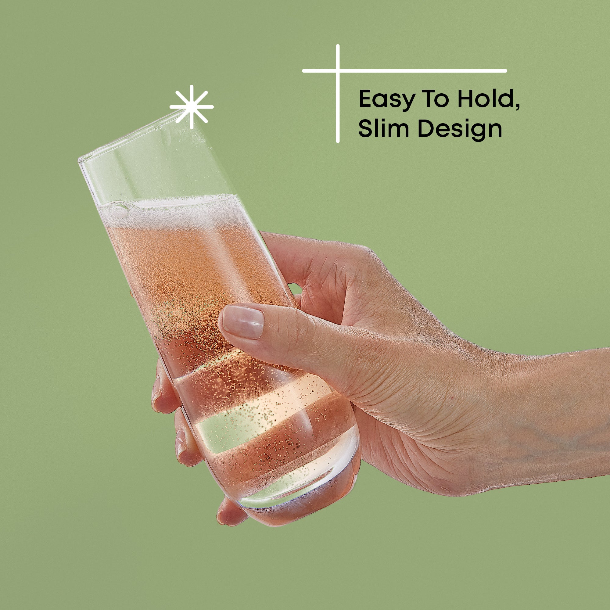 A hand holding a stemless champagne glass against a green background. Text on the image reads, “Easy To Hold, Slim Design.”
