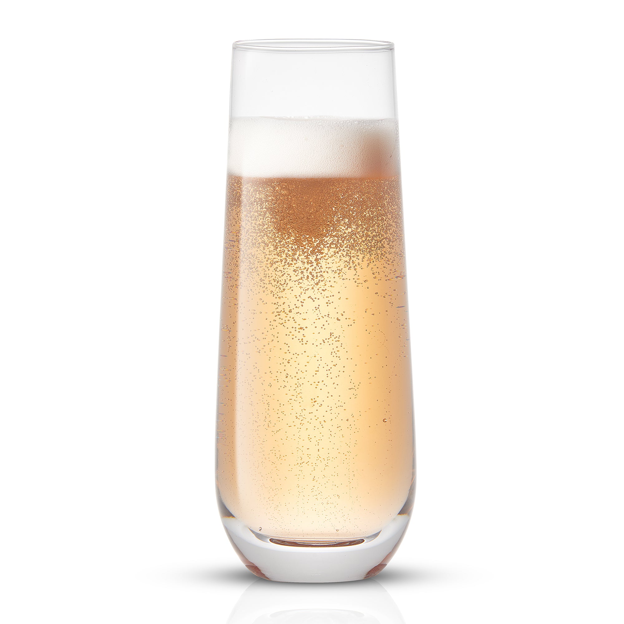 A tall, slender glass filled with champagne, with bubbles rising through the liquid.