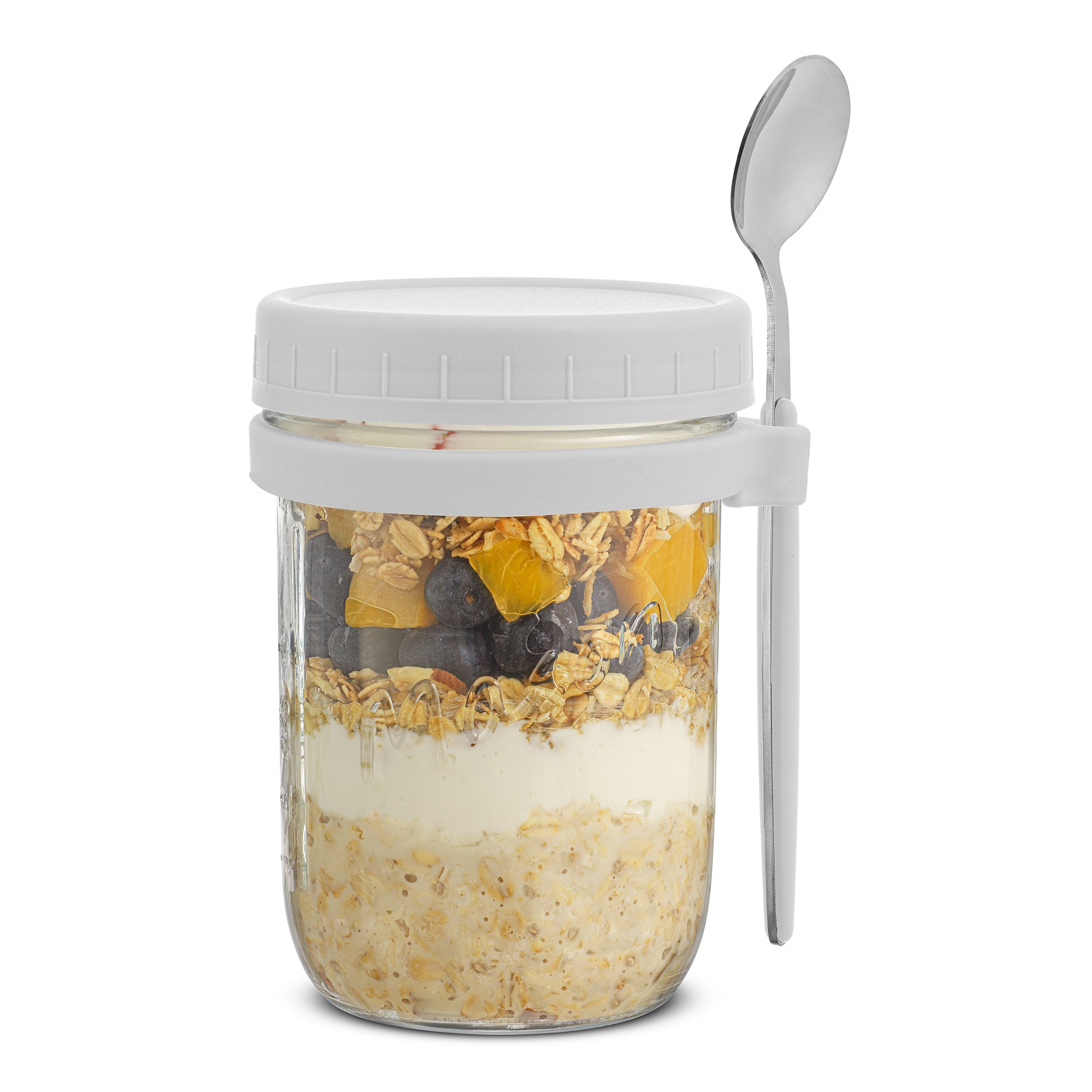 Closed lid of a white overnight oats container filled with fruit, yogurt, and granola.
