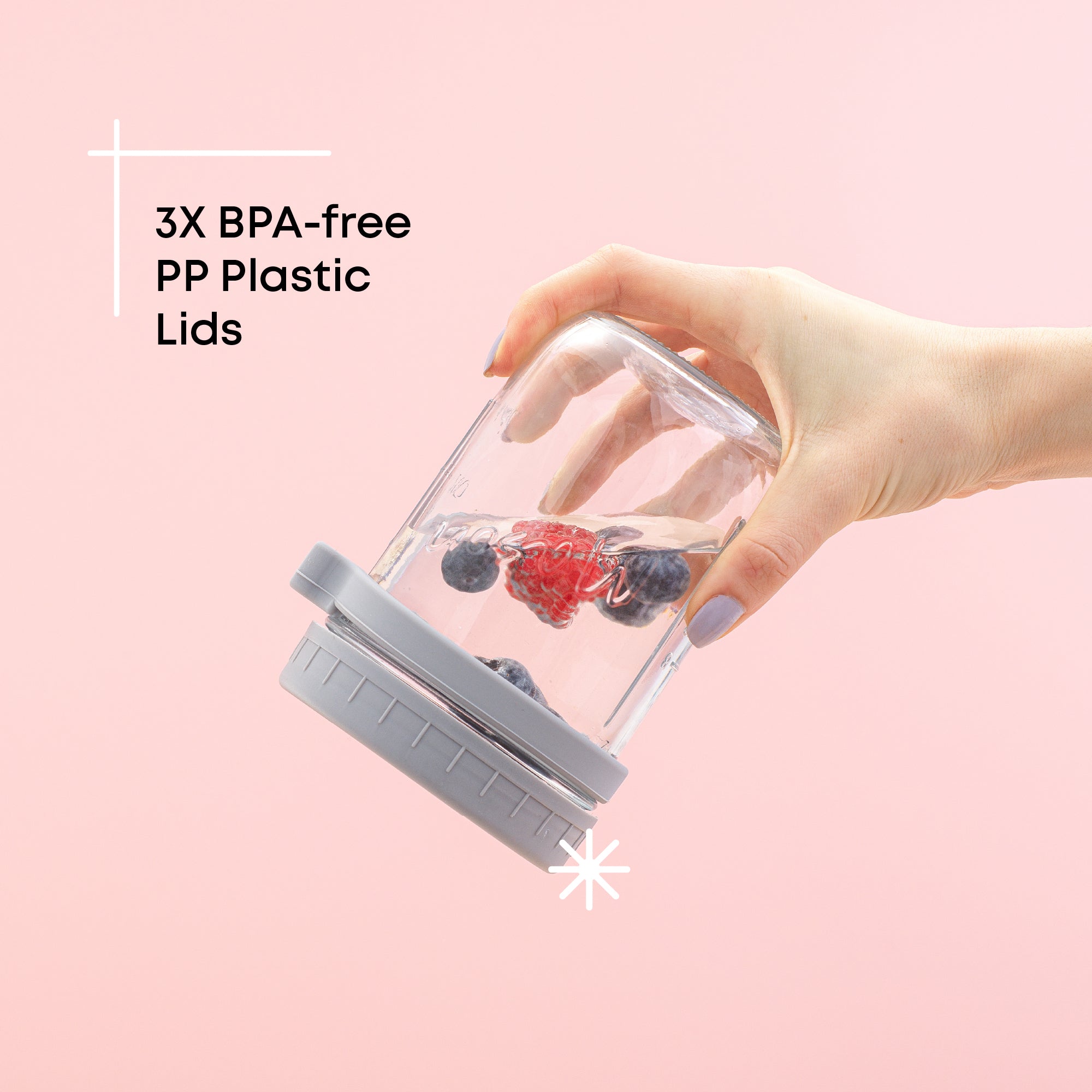 Grey overnight oats container tilted upside down with water and fruit showcasing the tight seal.