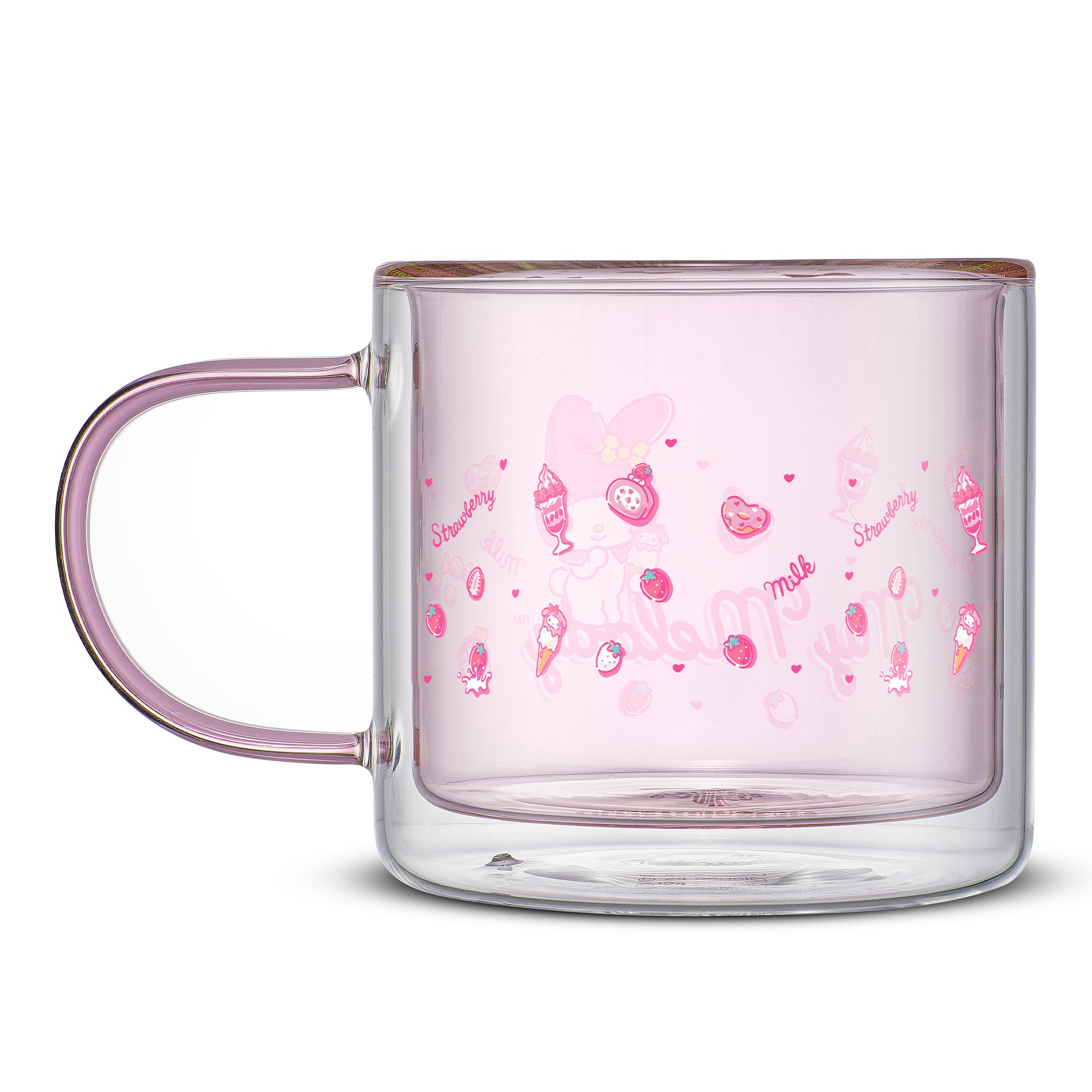 A pink glass mug with a Hello Kitty design. The mug has a pink handle and a white image with icons of strawberries and ice cream.