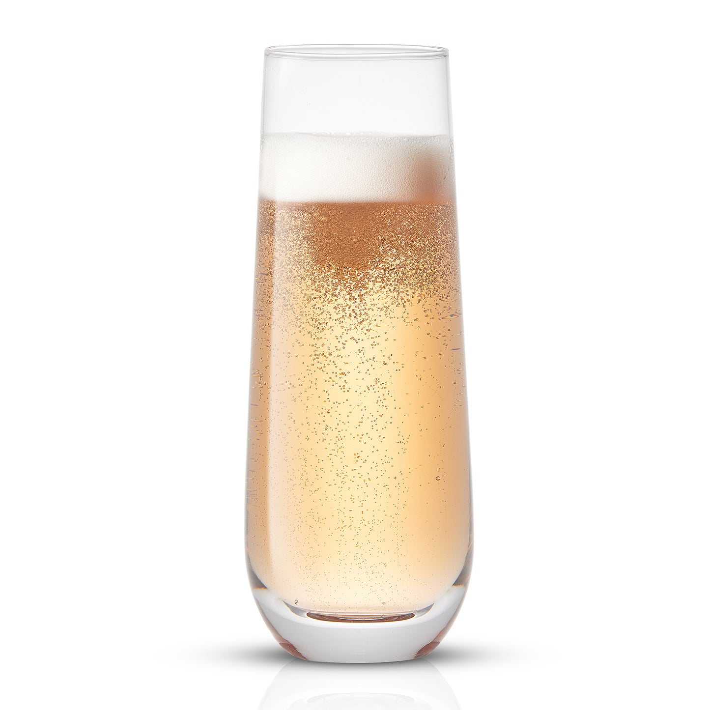 A tall, slender glass filled with champagne, with bubbles rising through the liquid.