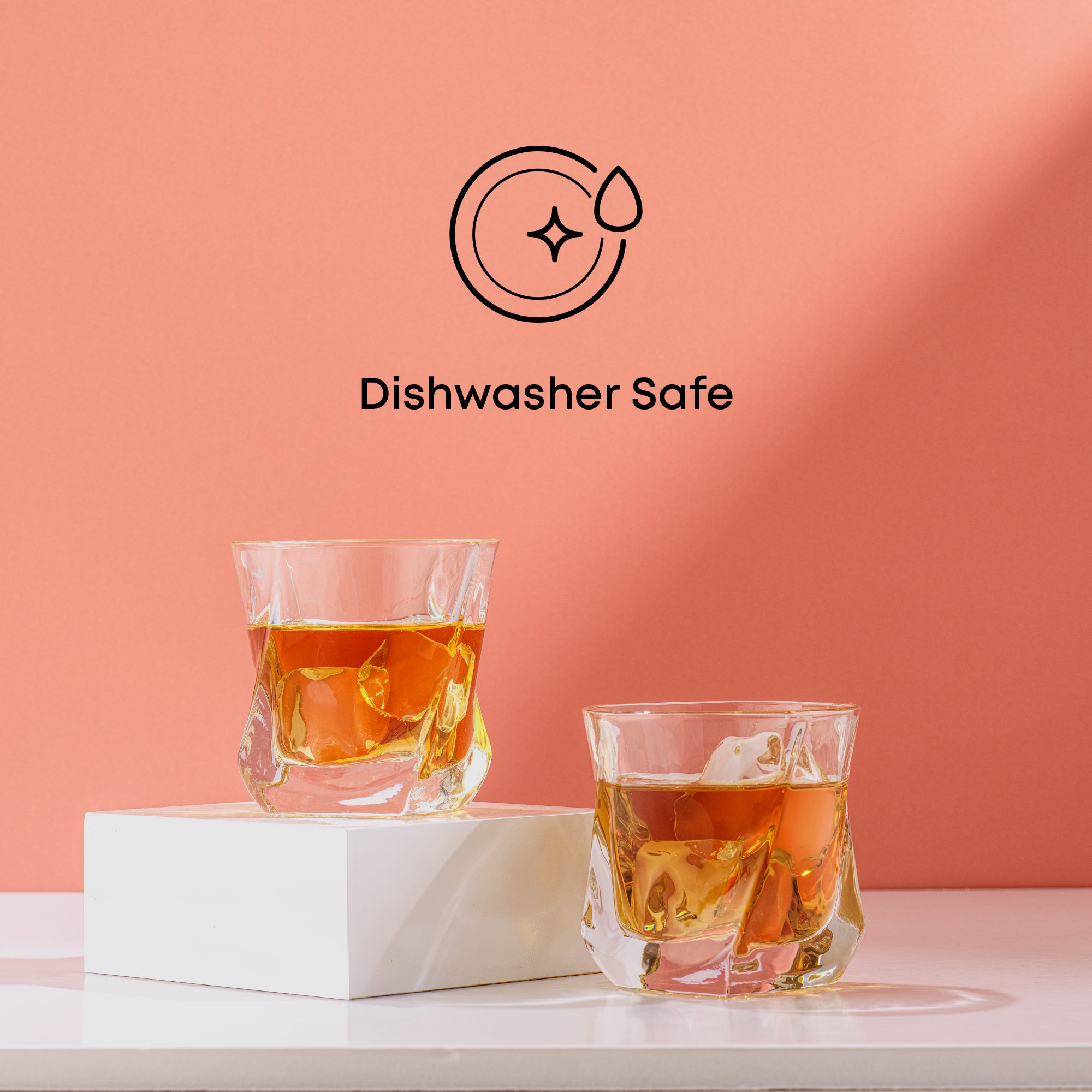A red background with two whiskey glasses. Text on image reads, “Dishwasher Safe.” 