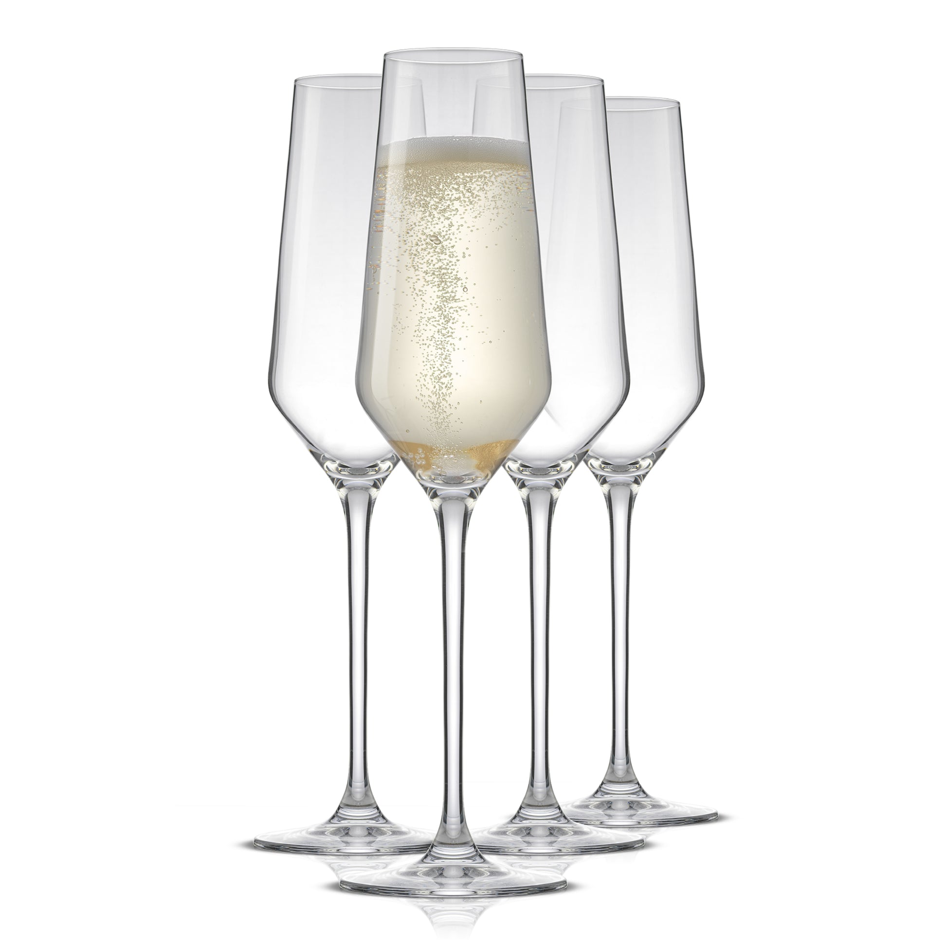 Set of four champagne flutes with one containing a bubbly white beverage on a white background