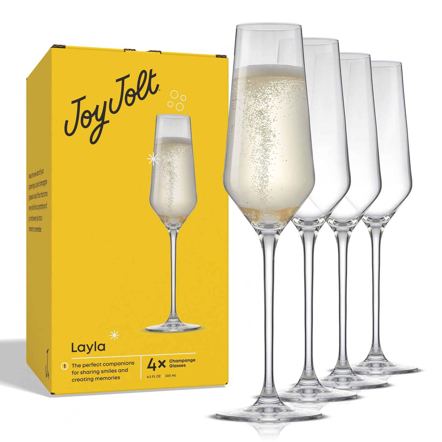 Set of champagne glasses with a yellow packaging JoyJolt box in the background
