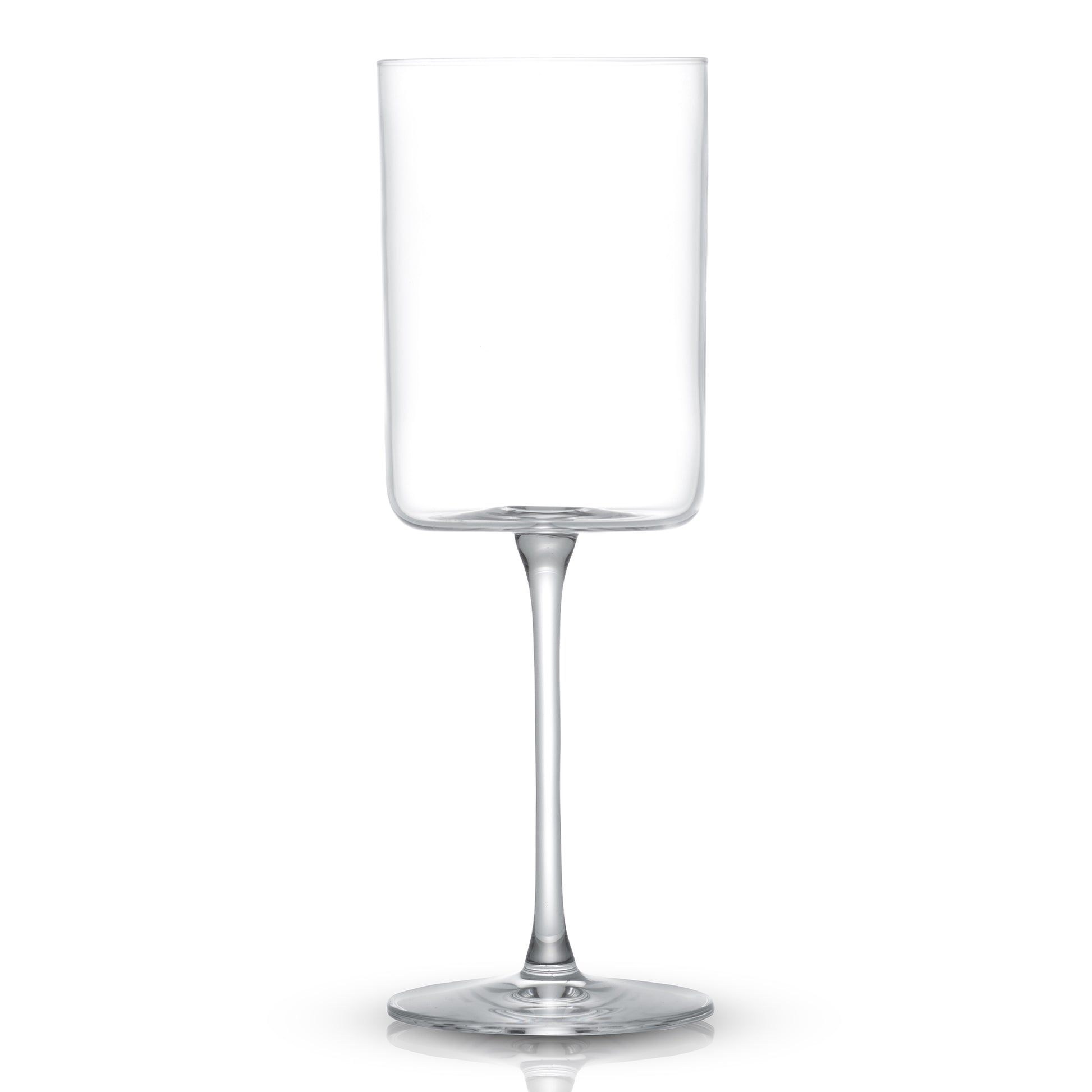 an empty clear wine glass against a white background