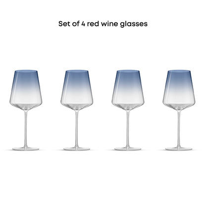 Set of 4 red wine glasses with gradient blue to clear design on a white background