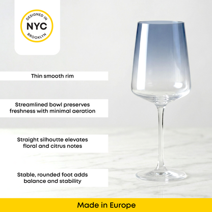 Clear wine glass with design features and 'Made in Europe' label on a white background