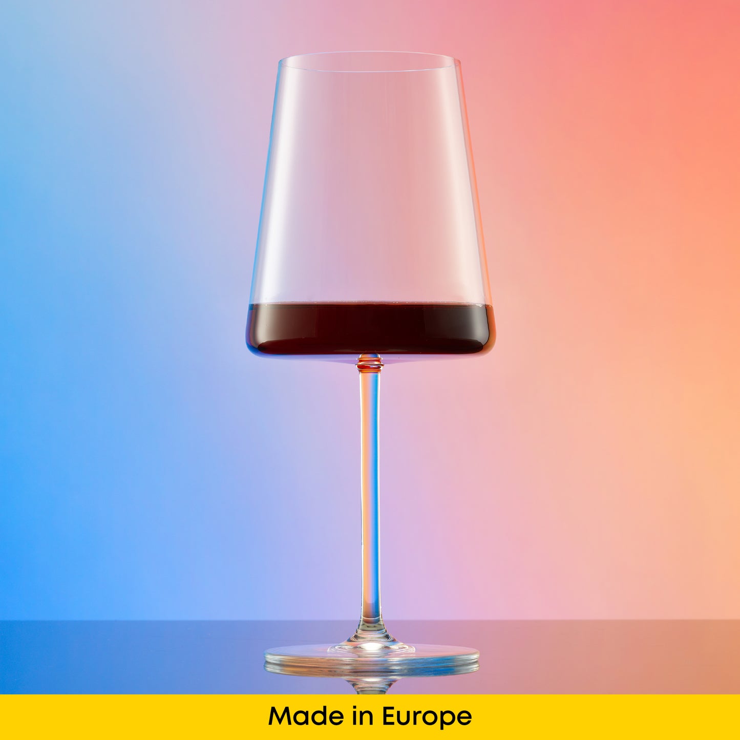 Modern wine glass on a gradient background with 'Made in Europe' text at the bottom.