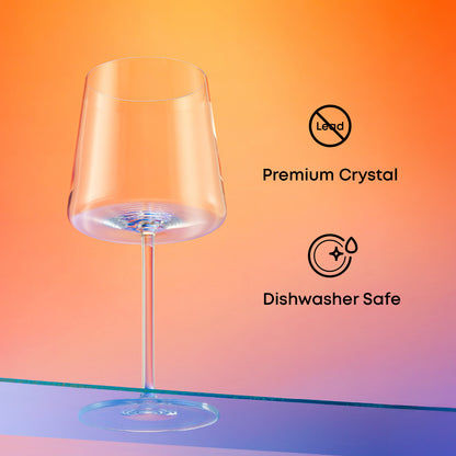 Clear wine glass with 'Premium Crystal' and 'Dishwasher Safe' icons on a gradient background