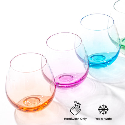 Orange, pink, and blue wine glasses shown with text "handwash only and freezer safe"