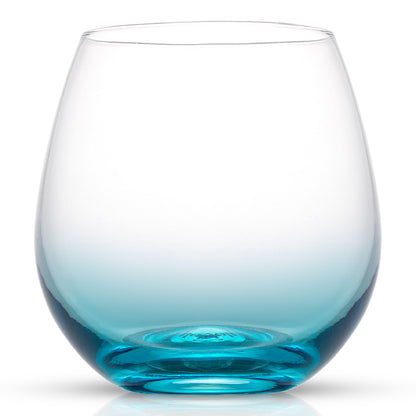 An empty blue-base ombre colored stemless wine glass on a white background