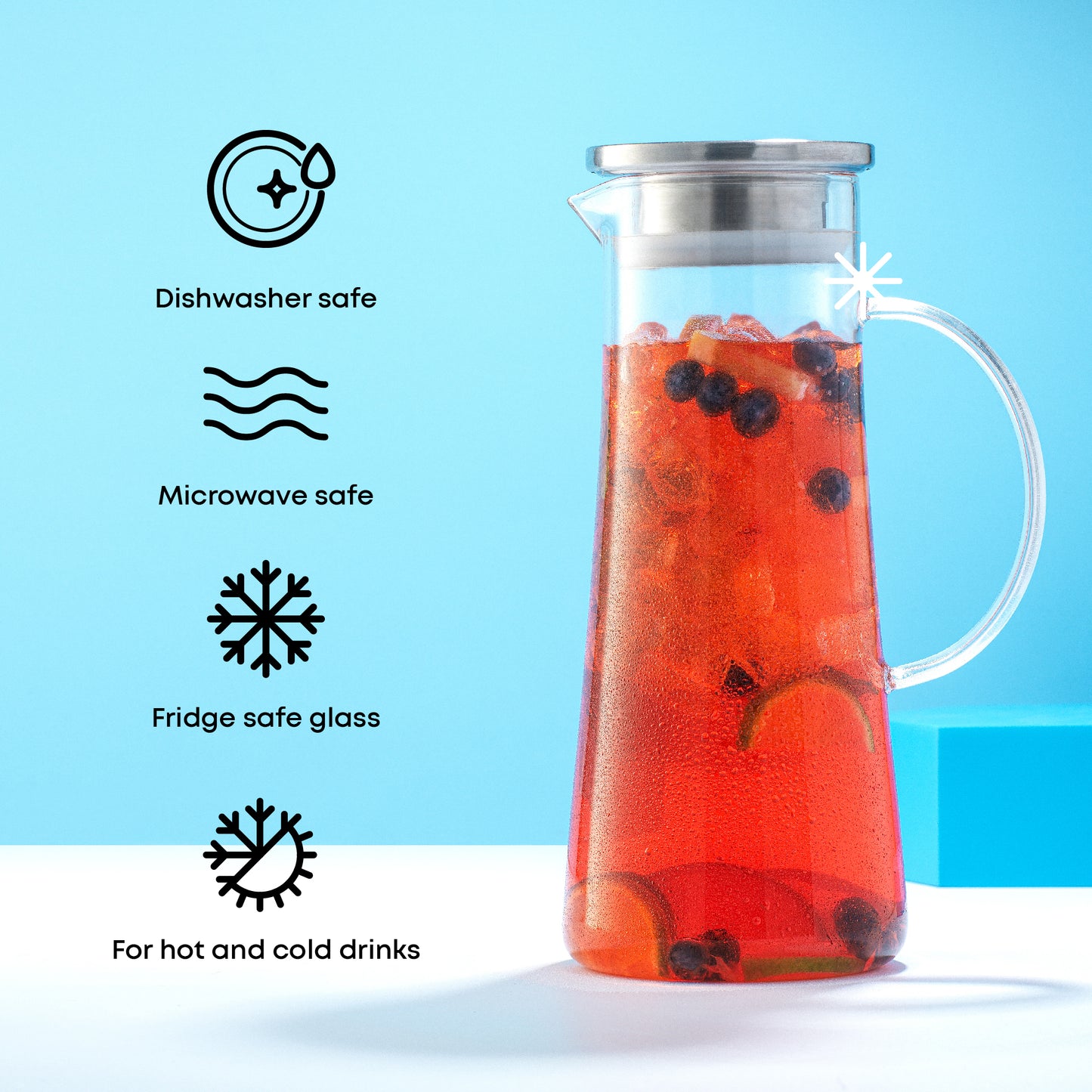 Pitcher with a red drink mixture inside against a blue background with text callouts: dishwasher, microwave, and fridge safe, made for hot and cold drinks.