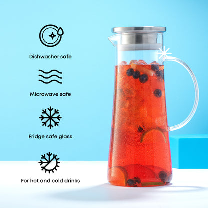 Pitcher with a red drink mixture inside against a blue background with text callouts: dishwasher, microwave, and fridge safe, made for hot and cold drinks.