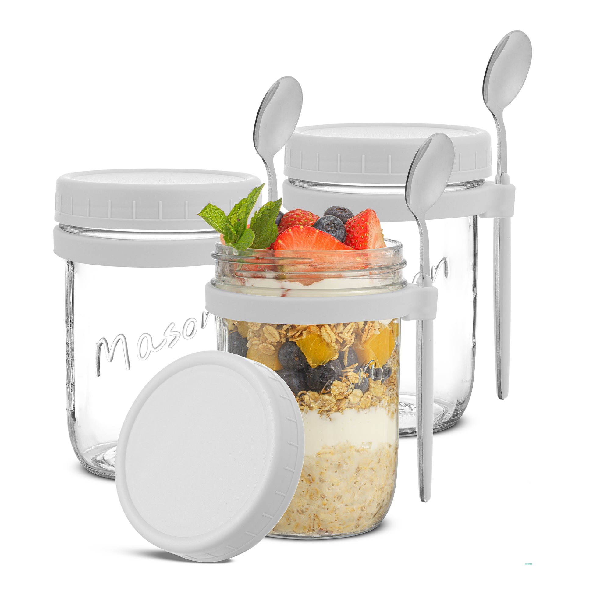 JoyJolt overnight oats containers with white lid filled with fruit and granola.