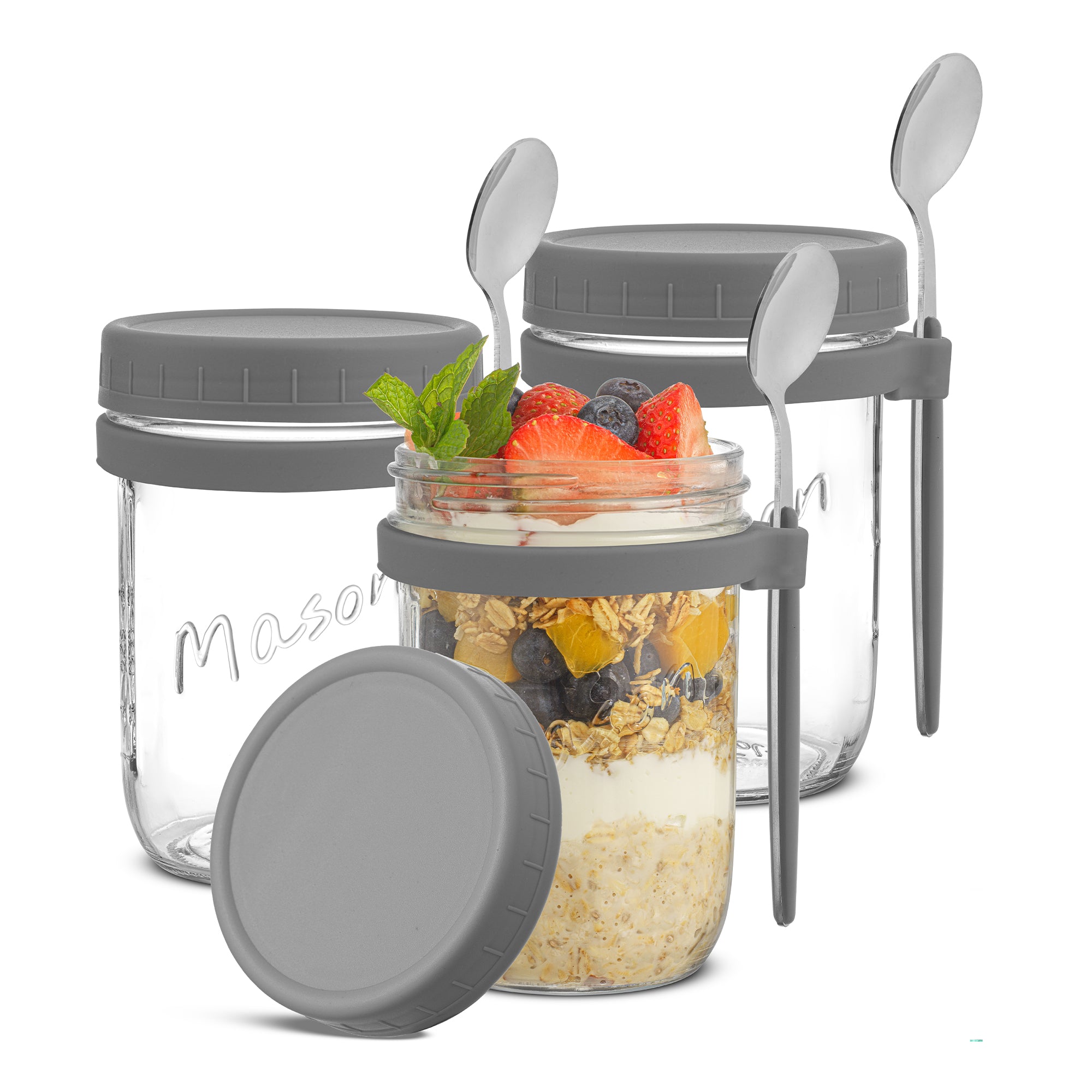 Three JoyJolt grey overnight oats container with spoons. 
