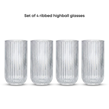 Set of 4 ribbed highball glasses on a white background