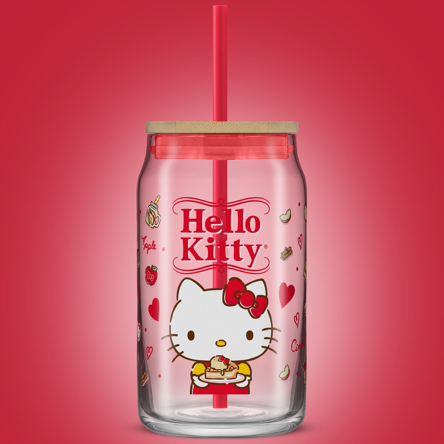 A JoyJolt x Hello Kitty tumbler glass with a bamboo lid and red straw.  