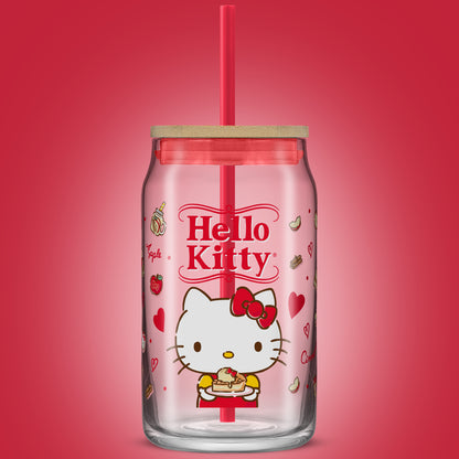 A JoyJolt x Hello Kitty tumbler glass with a bamboo lid and red straw.  