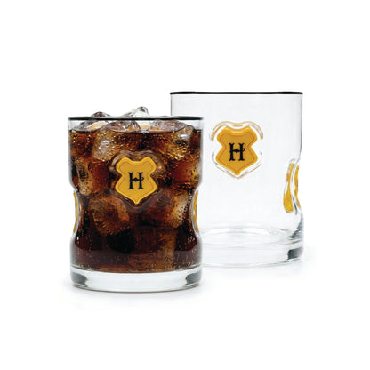 Two glasses with solid base with Harry Potter crest icon and black rim.