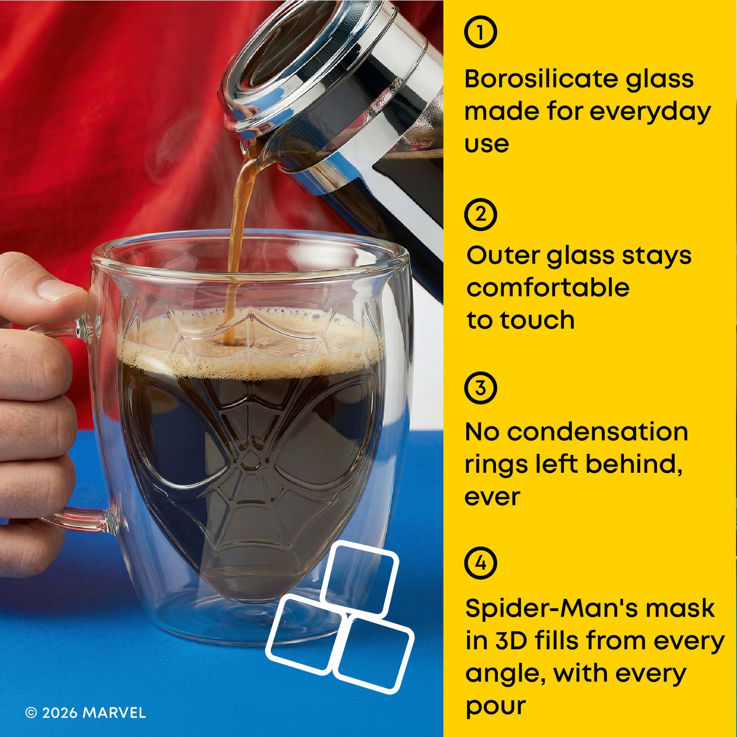 A double-walled clear glass mug with a Spider-Man web design is shown on a blue surface while coffee is being poured into it. A hand holds the mug, and a bright yellow text panel on the right lists four product features.