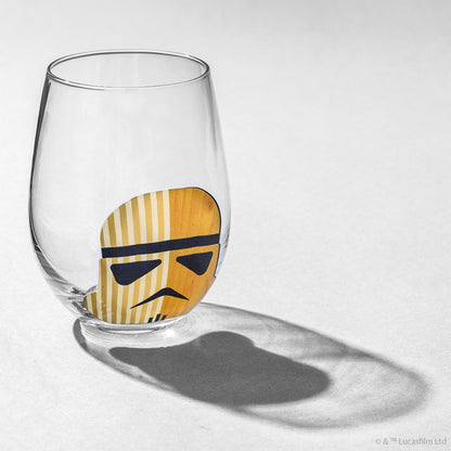A stemless clear glass with a stormtrooper helmet design against a white background.