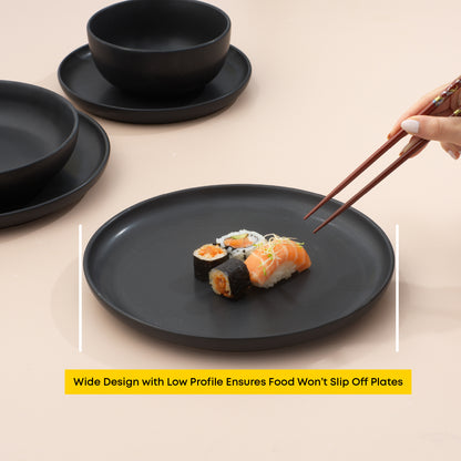 Sushi arranged on a dinner plate with a hand and chopsticks nearing to grab a piece, with text "wide design with low profile ensures food won't slip off plates."