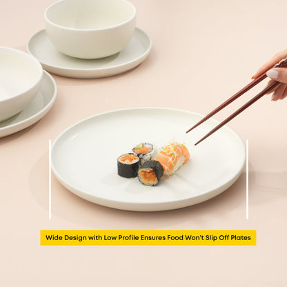 Sushi arranged on a dinner plate with a hand and chopsticks nearing to grab a piece, with text "wide design with low profile ensures food won't slip off plates."