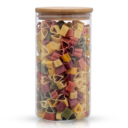 Storage jar with bamboo lid filled with heart shaped pasta. 