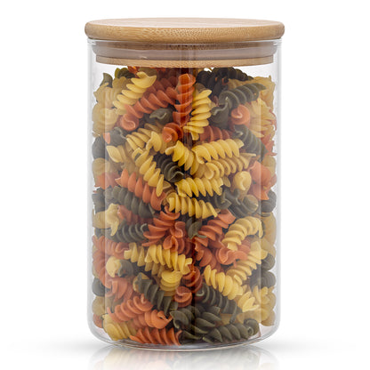 Storage jar with bamboo lid filled with rotelle pasta.