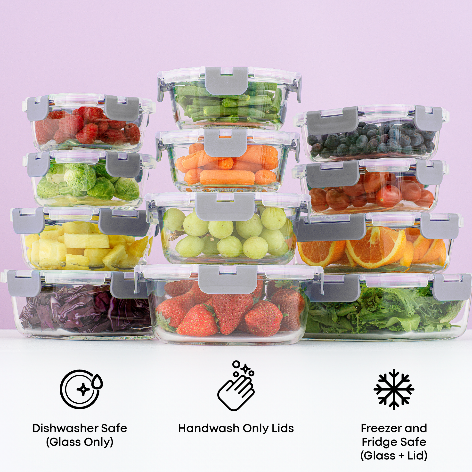 Set of clear food storage containers with fruits and vegetables on a white surface with a light purple background. Text call outs: dishwasher safe glass, handwash lids, freezer + fridge safe glass/lids.