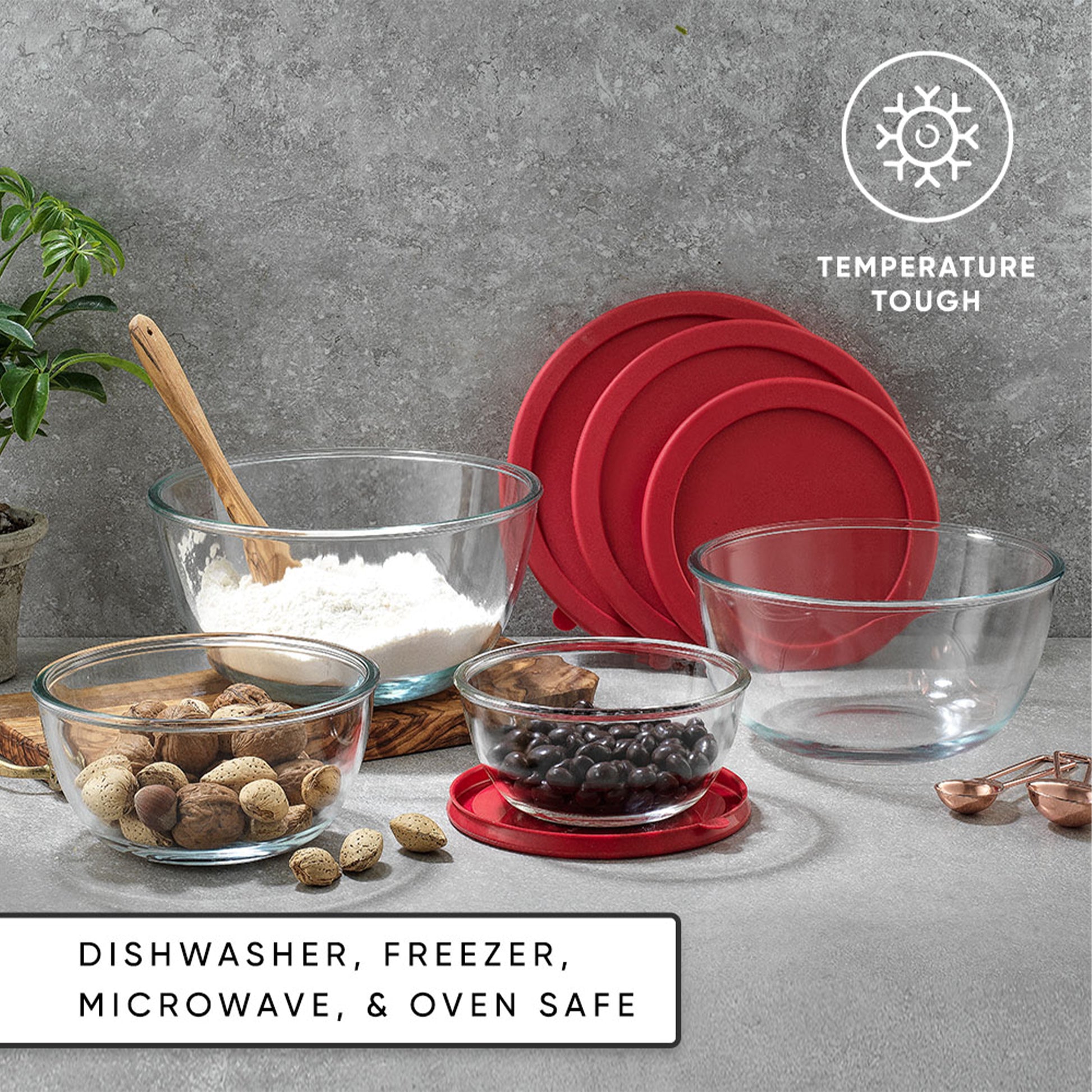 Four glass bowls full of different kitchen staples with text: dishwasher, freezer, microwave, and oven safe.