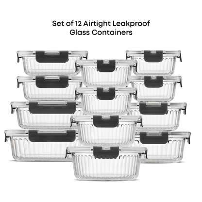Set of 12 airtight leakproof glass containers with black lids on a white background