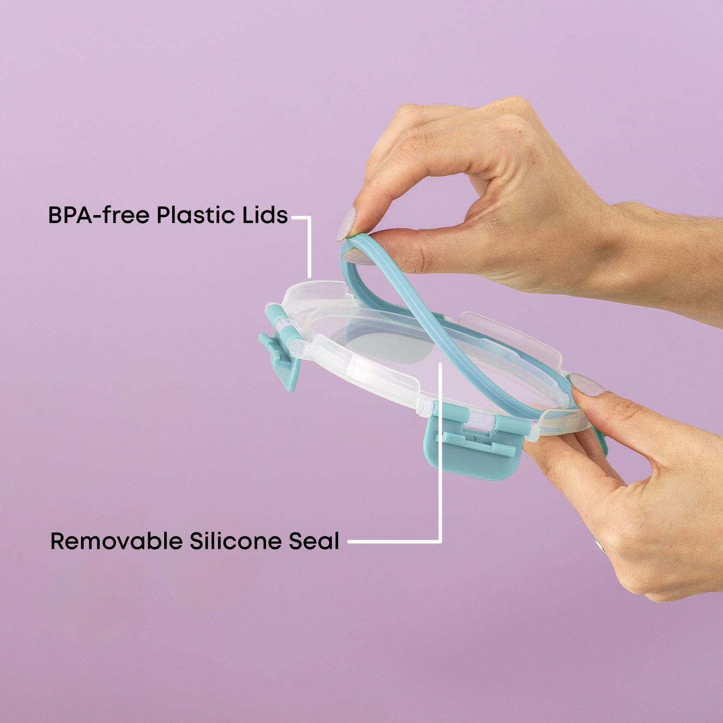 Hands holding a BPA-free plastic lid with a removable silicone seal against a purple background