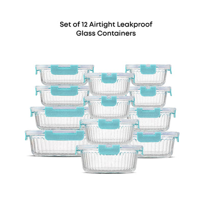 Set of 12 airtight leakproof glass containers with blue lids on a white background