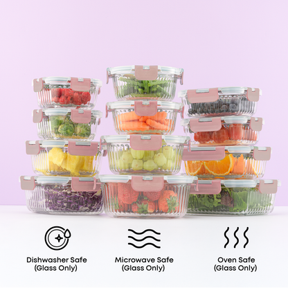 Set of clear food storage containers with fruits and vegetables on a white surface with a light purple background. Text call outs: dishwasher, microwave, and oven safe glass only.
