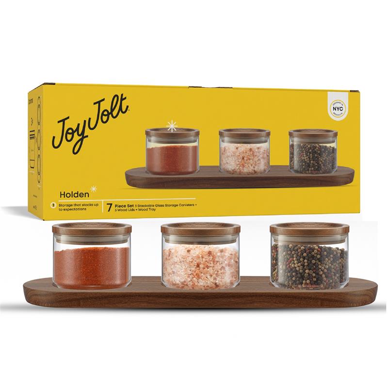 Set of glass canisters with a yellow packaging JoyJolt box in the background