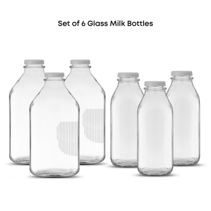 Six clear glass milk bottles with white caps arranged in two rows on a white background