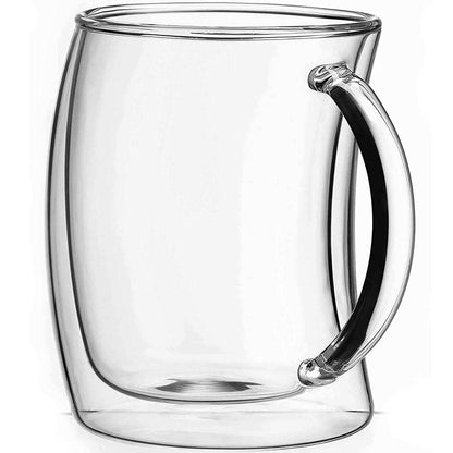 An empty double wall glass mug against a white background