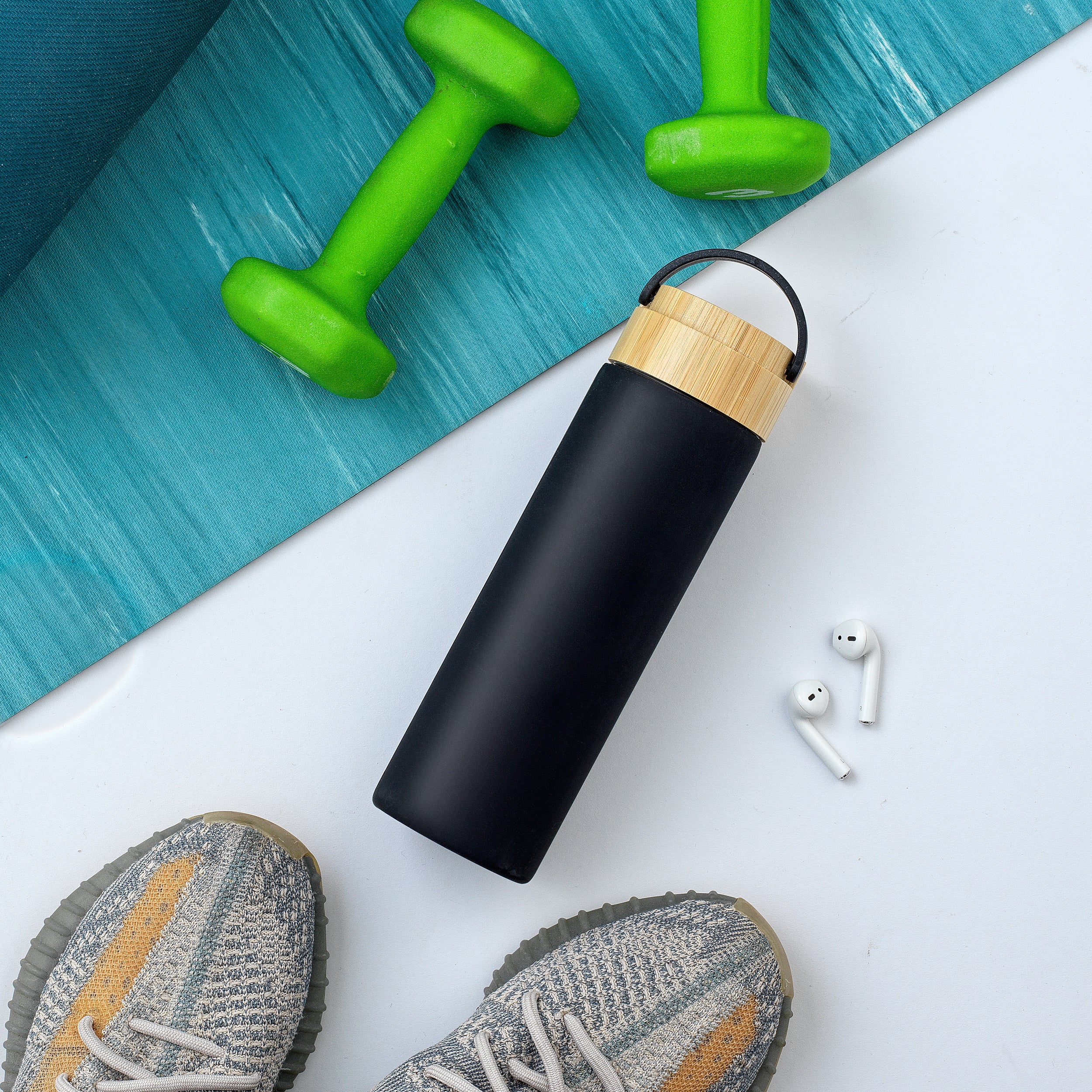 JoyJolt Glass Water Bottle with Strap and Silicone Sleeve
